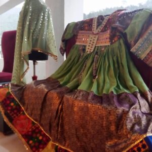Bridal Afghani Frock in teal velvet with silver embroidery and mirror work, blending traditional Afghan design with modern elegance