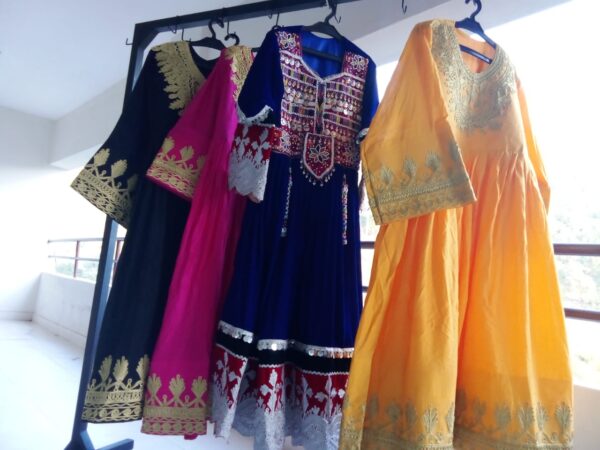 Afghani frock with princess design, velvet fabric, and traditional embroidery
