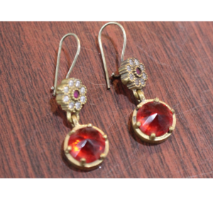 Zircon earrings with red gemstone and gold-tone floral hook design